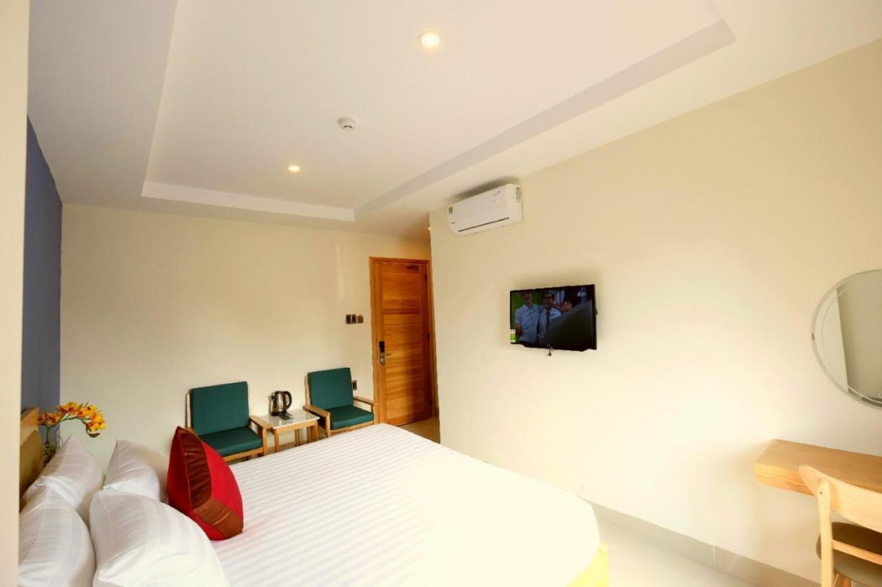 Marigold Hotel & Apartment Дананг Экстерьер фото